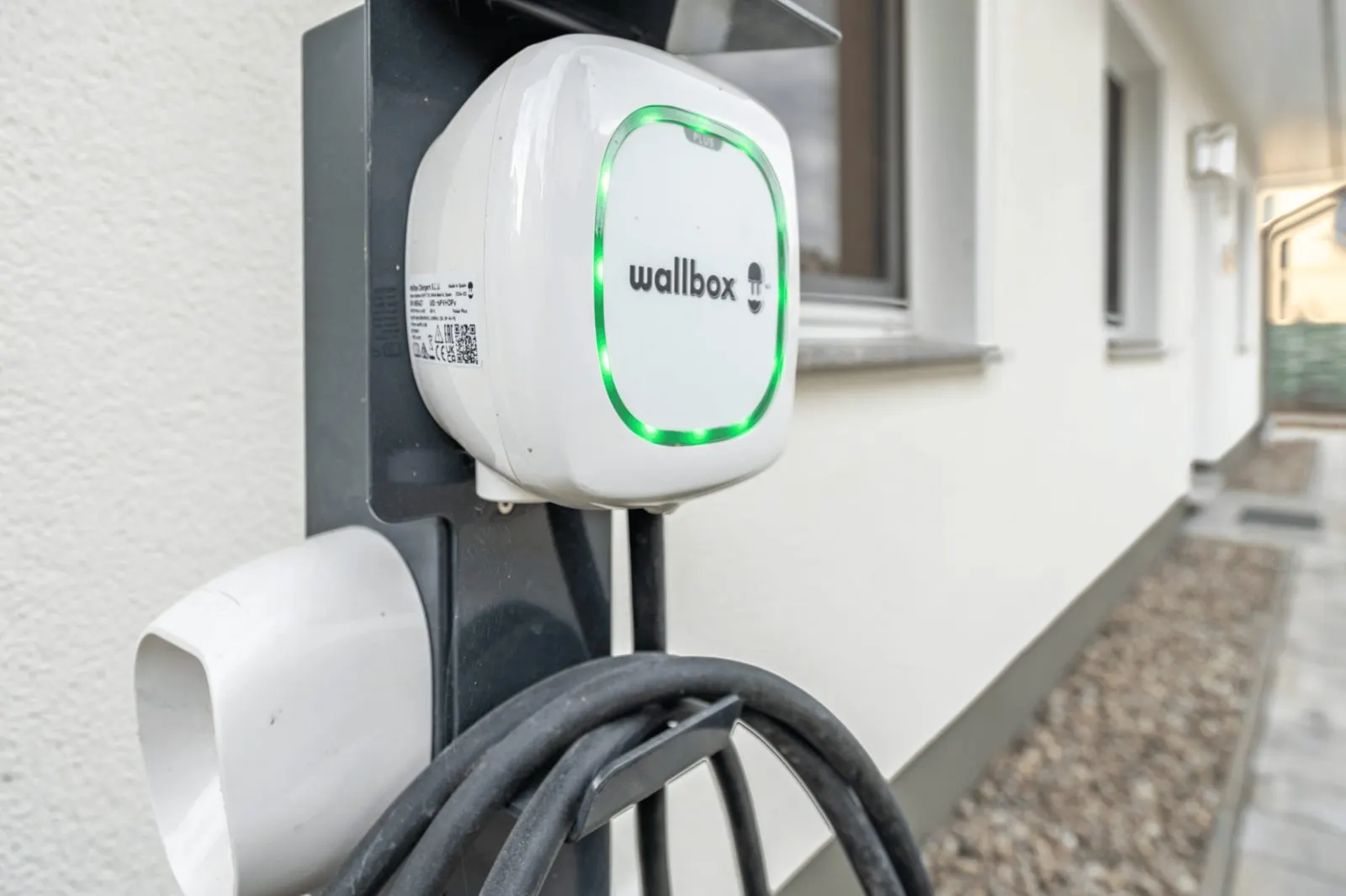 EV charging point on the wall of the holiday home